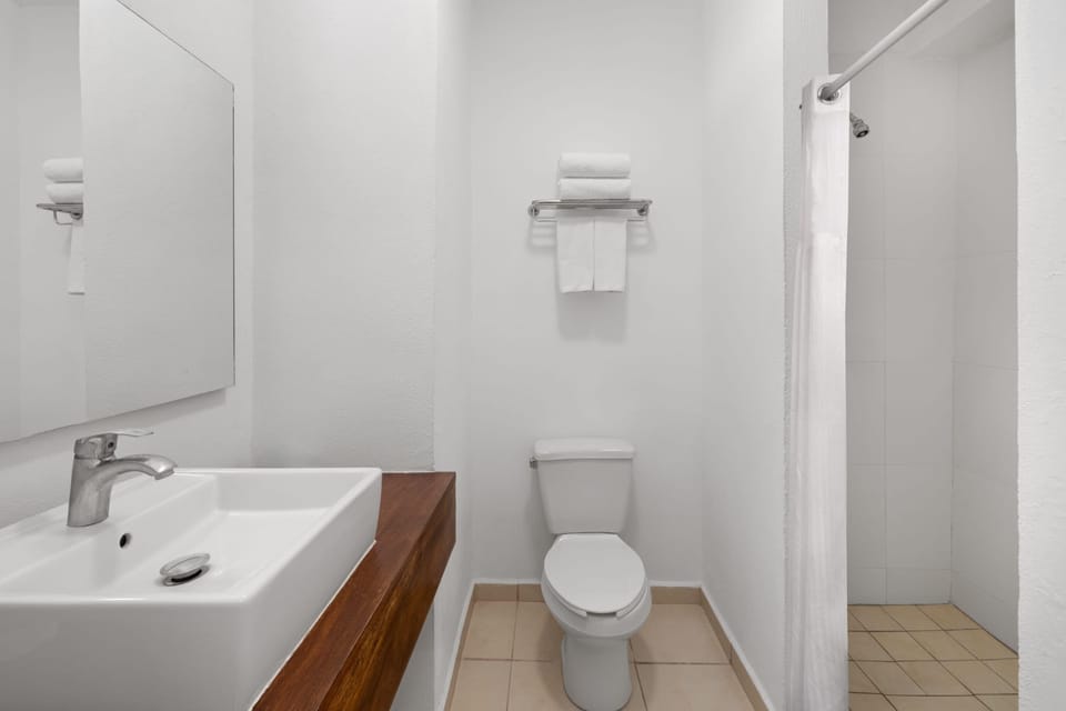 Shower, eco-friendly toiletries, hair dryer, towels