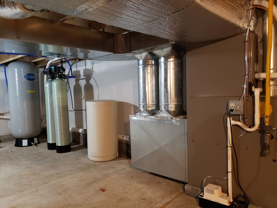 Well water year round, fully treated and softened.  Furnace and air conditioning