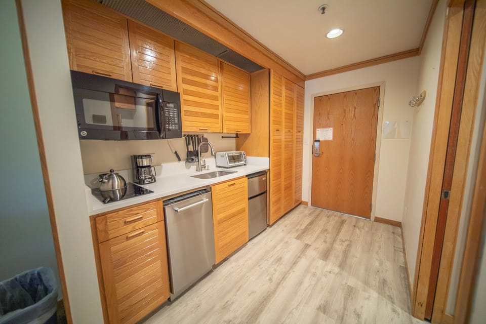Front door and kitchenette