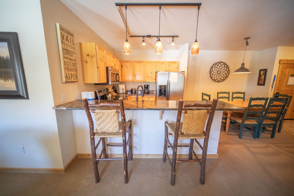 Updated kitchen with bar stool seating