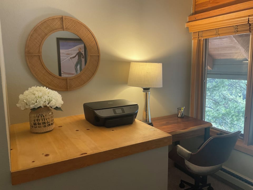 Office area that overlooks the living room