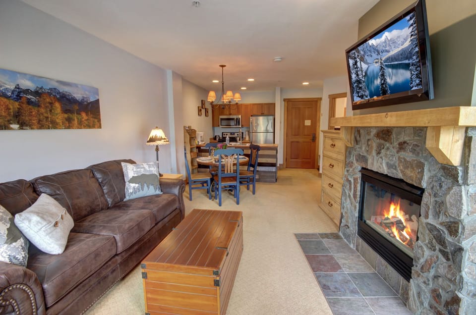 Living room with a flat screen TV and gas fireplace