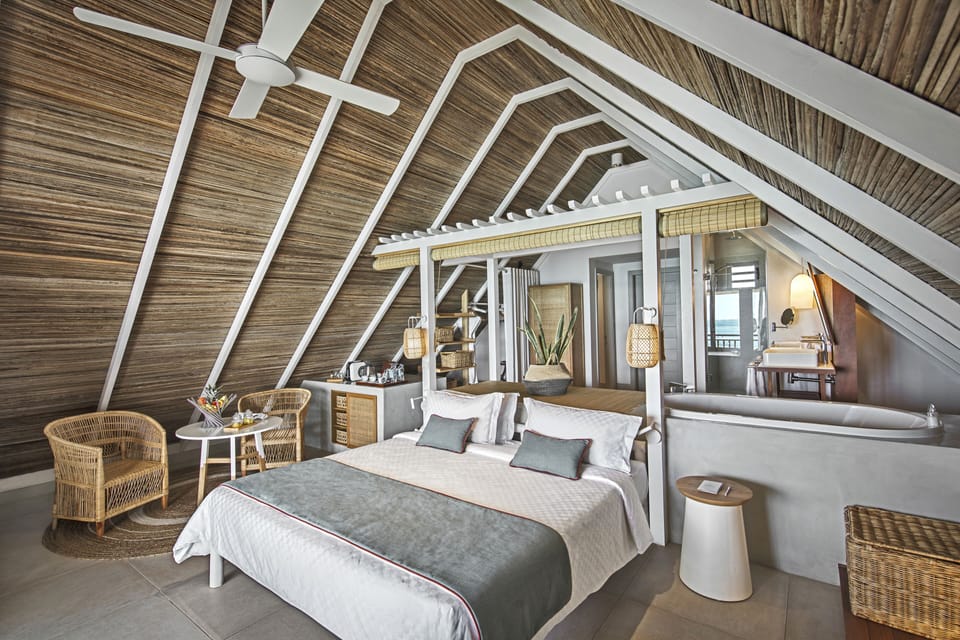 Junior Suite, Sea View | Minibar (some free items), in-room safe, desk, laptop workspace