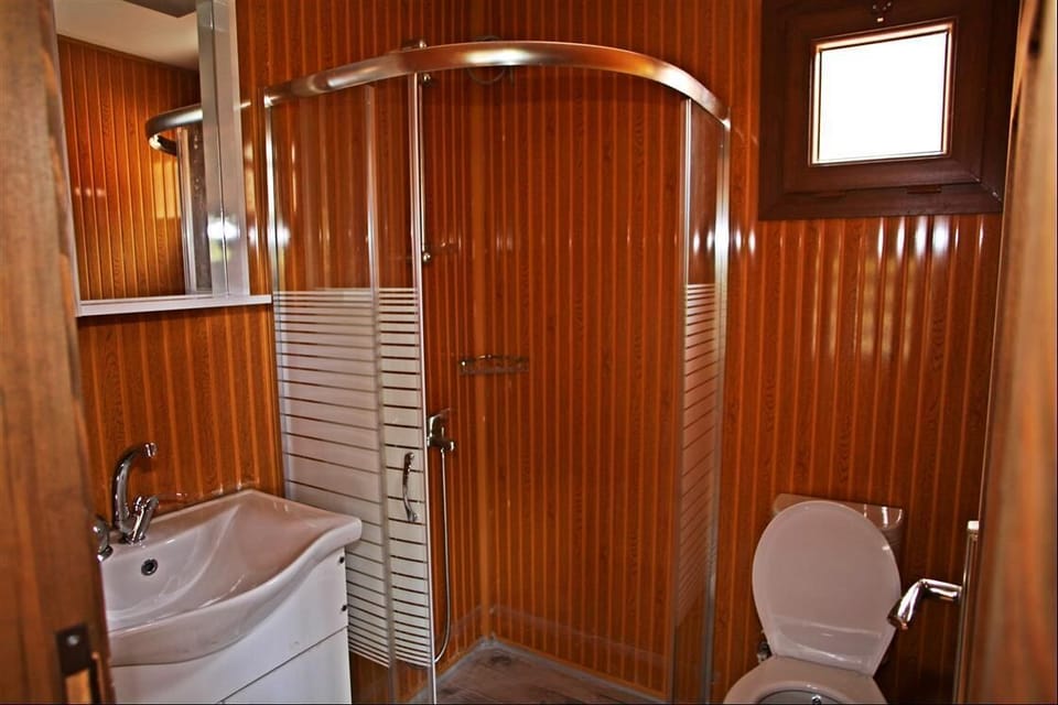 Bungalow, 1 Double Bed | Bathroom | Shower, towels, soap, shampoo