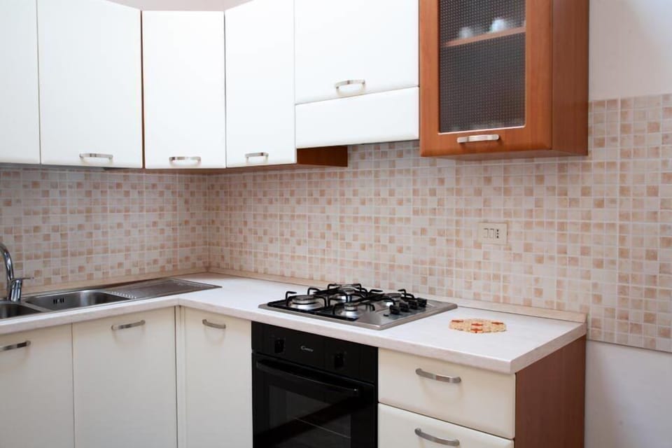 Apartment, 1 Bedroom | Private kitchen | Full-size fridge, oven, stovetop, espresso maker