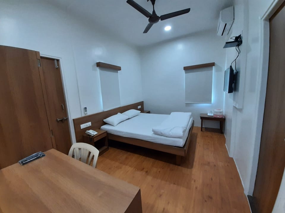 Executive Room, City View | Premium bedding, individually furnished, desk, laptop workspace