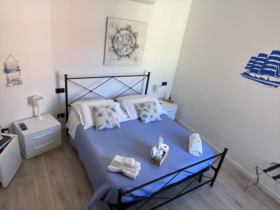 Economy Double Room | In-room safe, desk, free WiFi, bed sheets