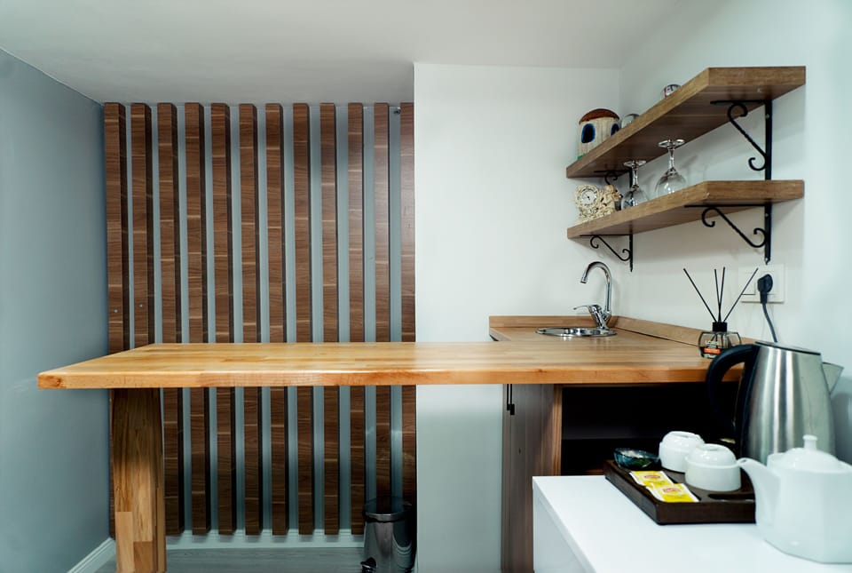 Family Room | Private kitchen | Coffee/tea maker, electric kettle, cookware/dishes/utensils