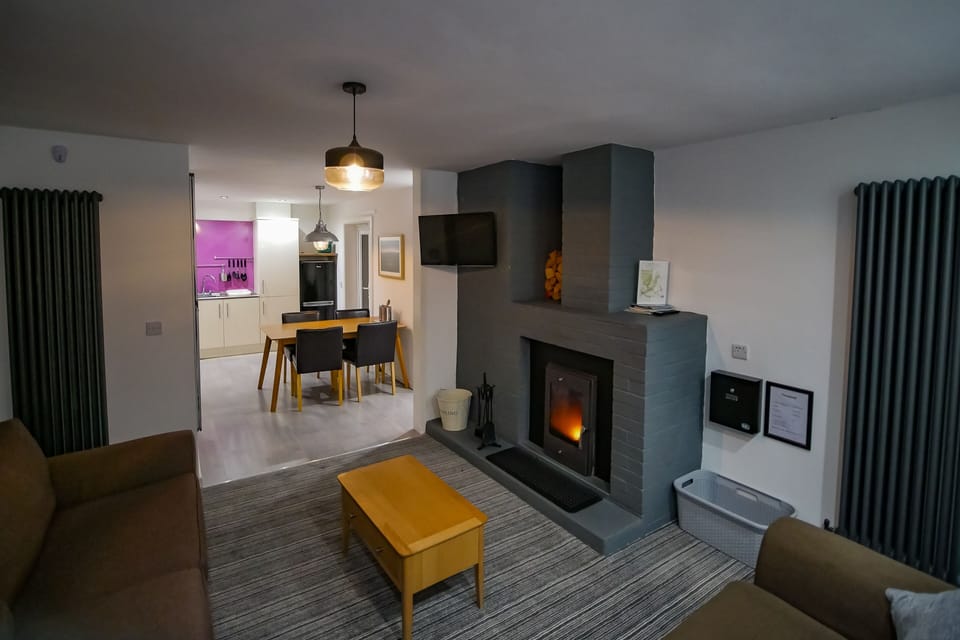 Bungalow, 2 Bedrooms | Living area | Flat-screen TV, fireplace, DVD player
