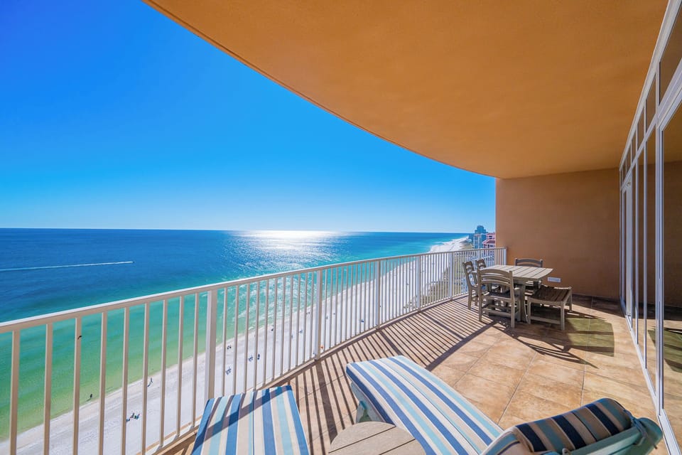 Watch the coastline stretch into the distance and the horizon meet the sky from your balcony while you soak up the sun