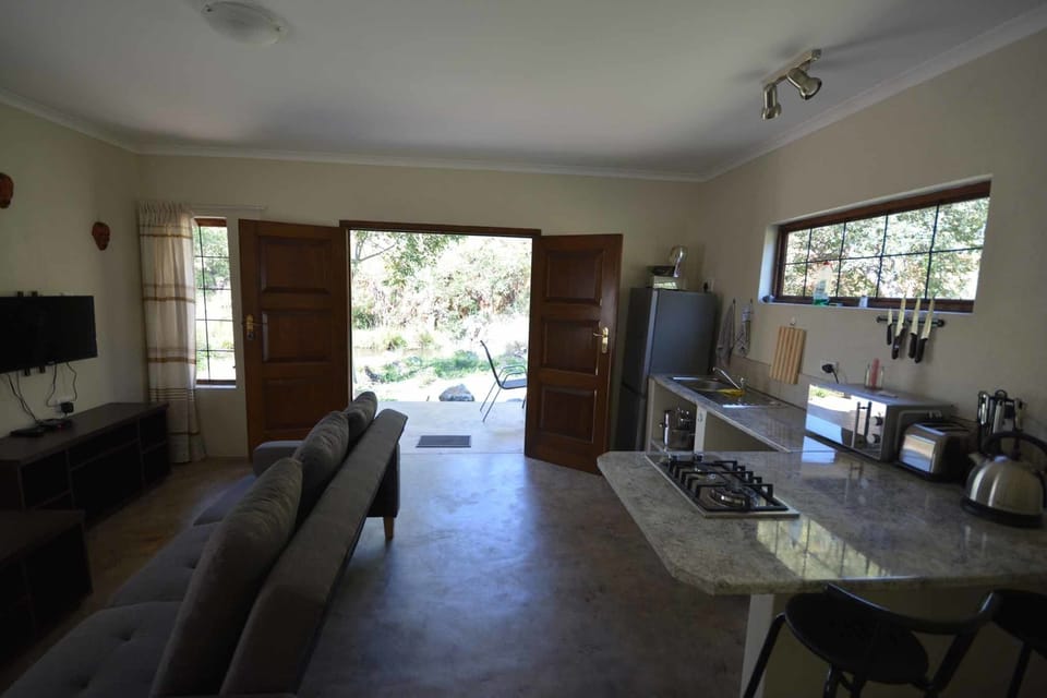 Superior Cottage, 1 King Bed with Sofa bed, River View (Mills) | Living area | 32-inch LED TV with satellite channels