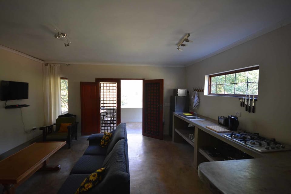 Family Cottage, 1 Bedroom, River View (Reed) | Living area | 32-inch LED TV with satellite channels