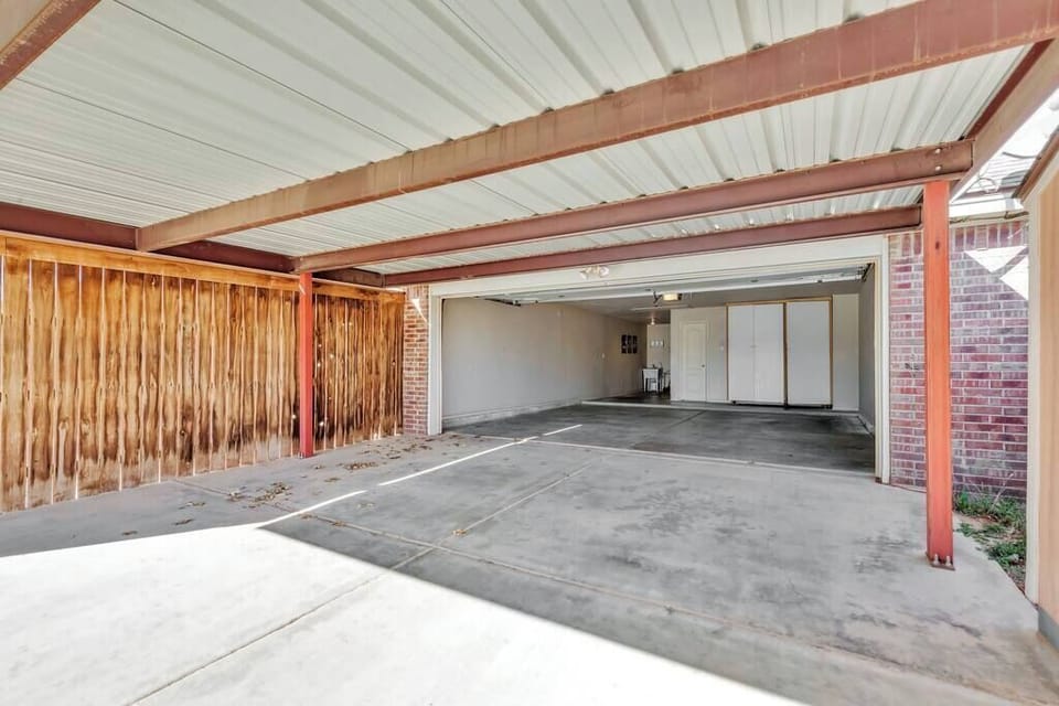 Over-Sized Two Car Garage plus Carport