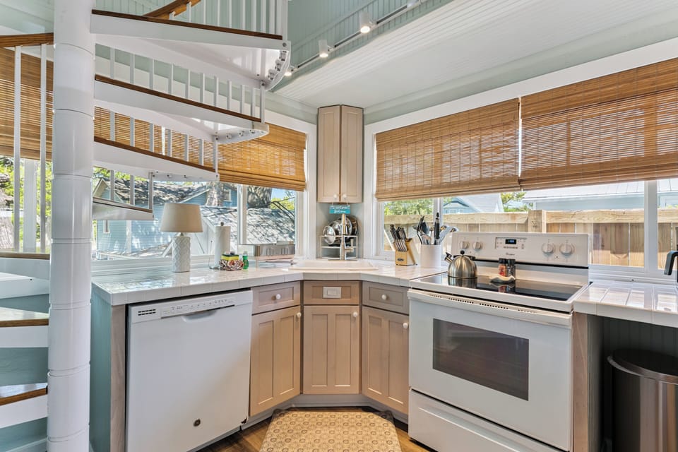 Your bright, fully-equipped kitchen welcomes you with warm wood tones and modern appliances for effortless meal prep.