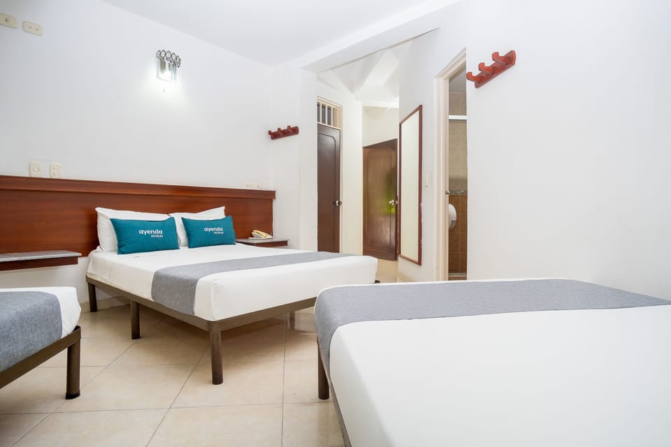 Quadruple Room | Hypo-allergenic bedding available, WiFi (free), bed sheets
