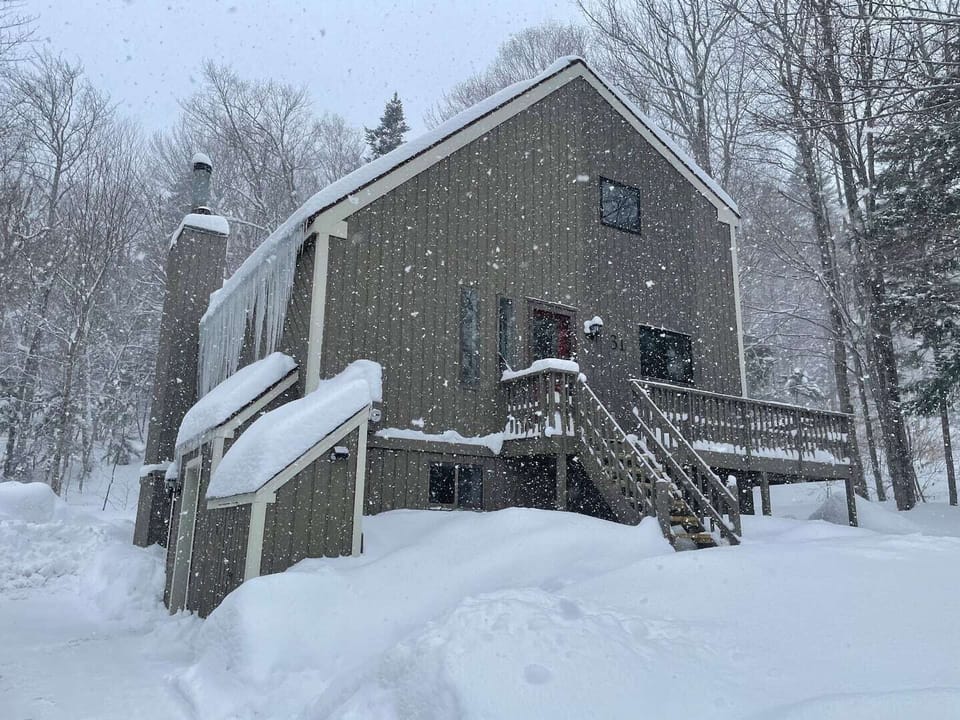 Chalet style home on private lot, wrap around deck