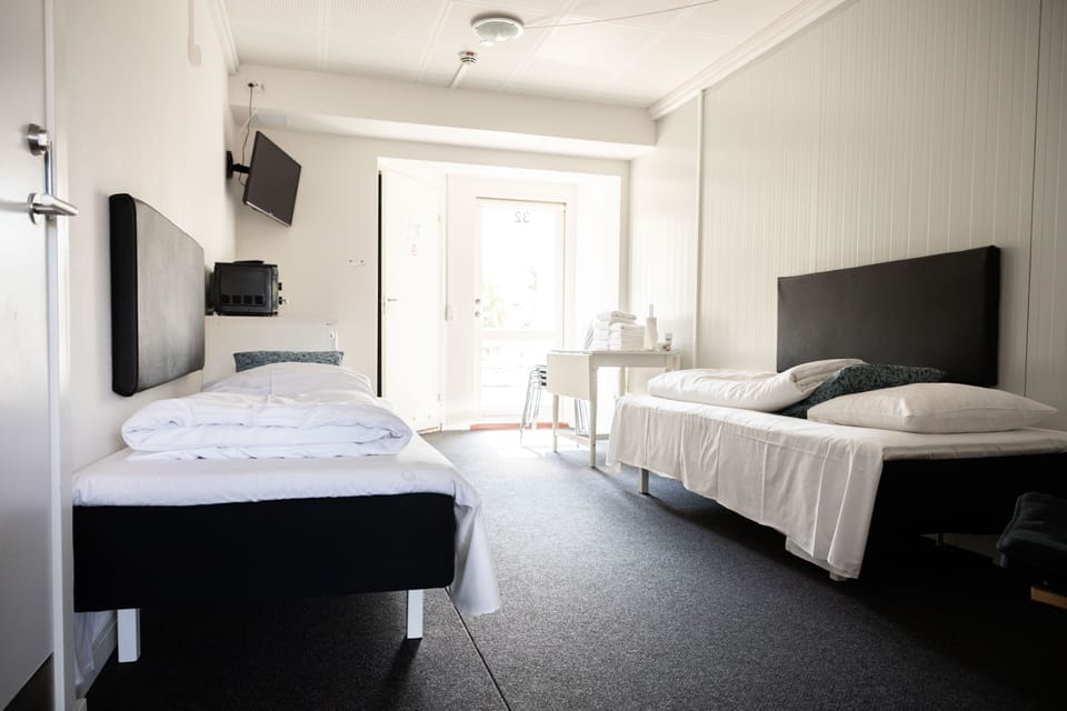 Family Room, 2 Bedrooms | Laptop workspace, blackout drapes, free WiFi, bed sheets