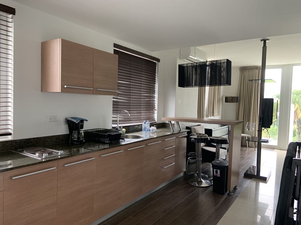 Family Room | Private kitchenette | Coffee/tea maker, full-size fridge, microwave