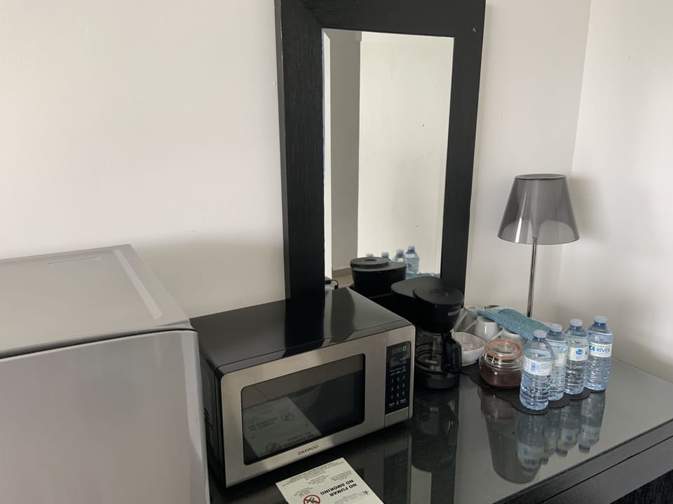 Room, 2 Double Beds | Private kitchenette | Coffee/tea maker, full-size fridge, microwave