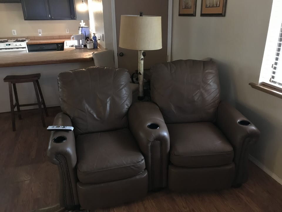 Great Room theatre seats fully recline to sleep two!