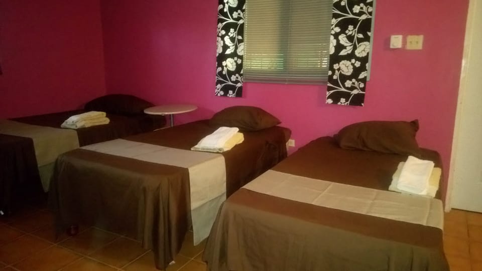 Triple Room (With A/C) | In-room safe, iron/ironing board, free WiFi, bed sheets