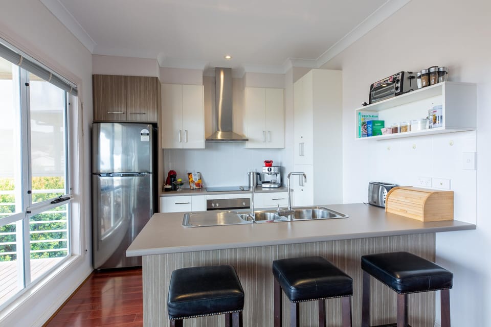 Upstairs kitchen. Fully equipped with dishwasher microwave and fridge.