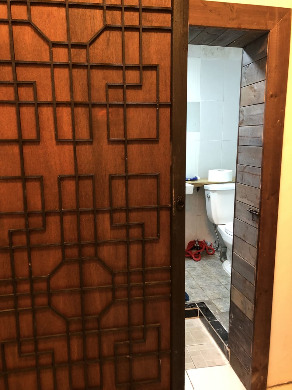 Shower, hair dryer, slippers, towels