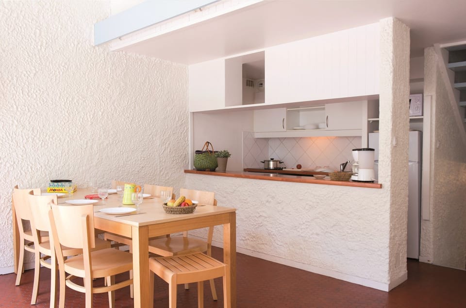 Reconnect with loved ones over a meal at the dining table.