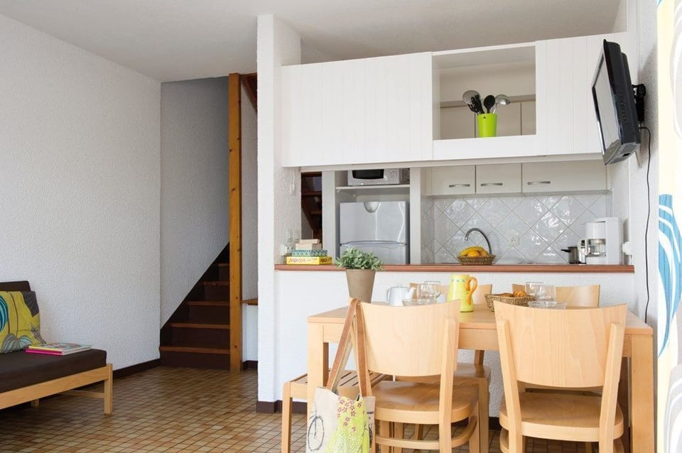 Reconnect with loved ones over a meal at the dining table.