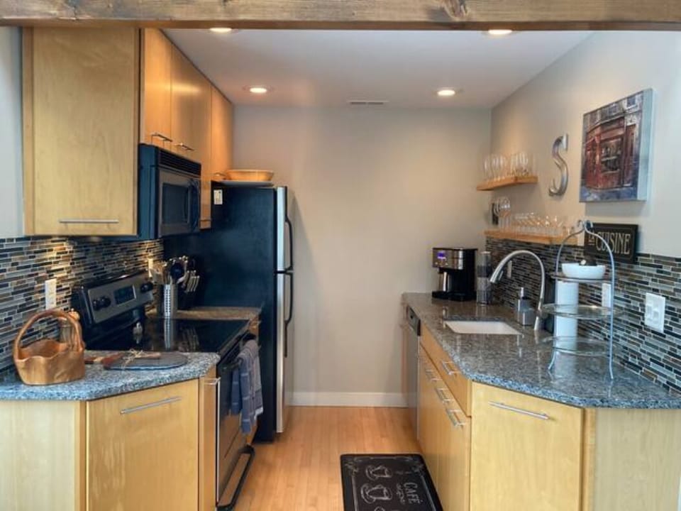 Beautiful kitchen stocked with all the neccessities to prepare a gourmet meal!