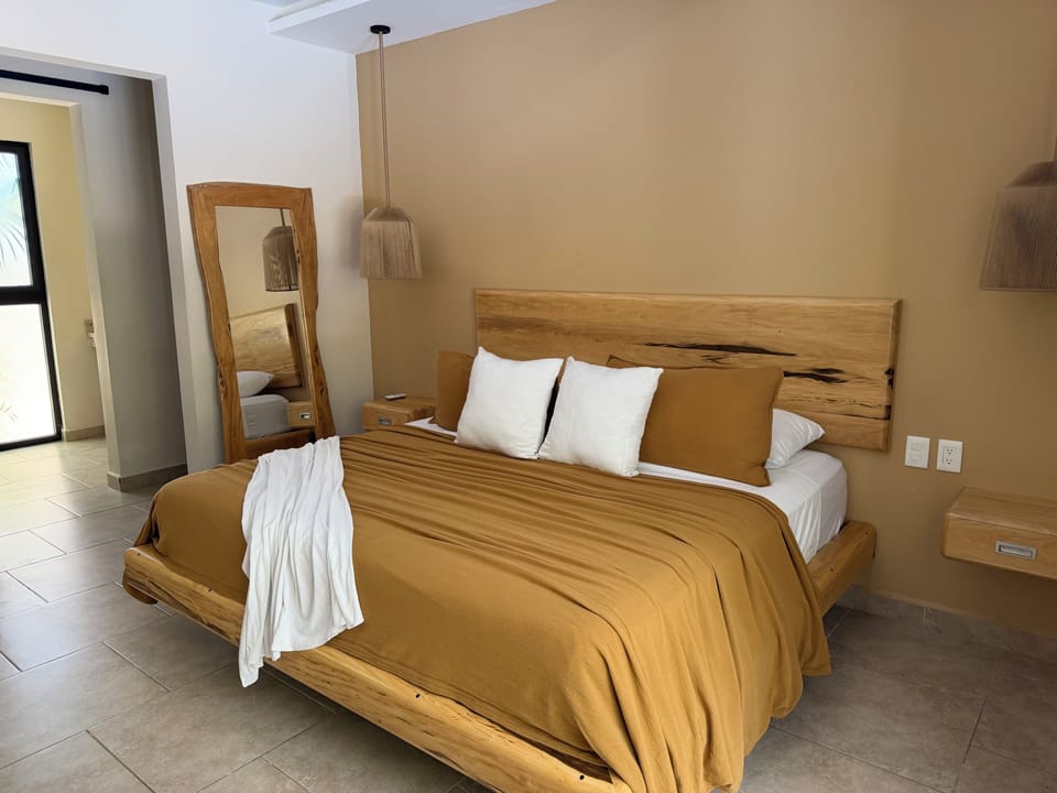 Master king size bedroom with pool view and full bath
