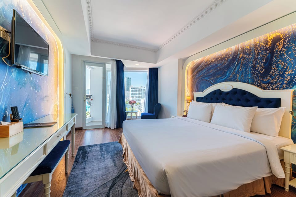 Deluxe Double Room, City View | Minibar, in-room safe, desk, blackout drapes