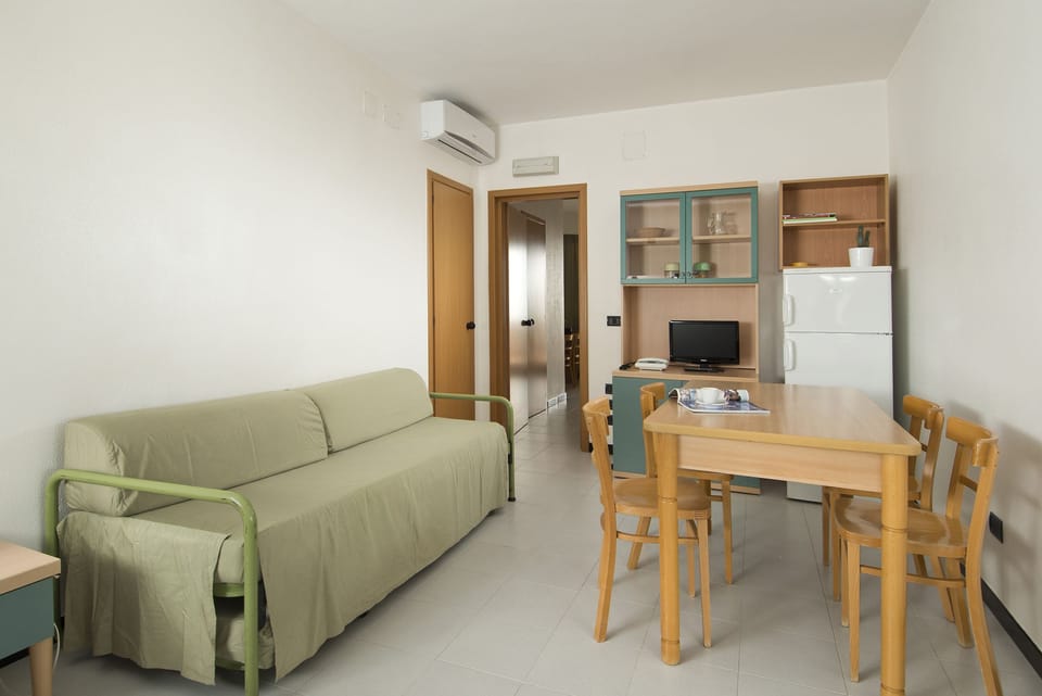 Apartment, 1 Bedroom | Living area | Flat-screen TV