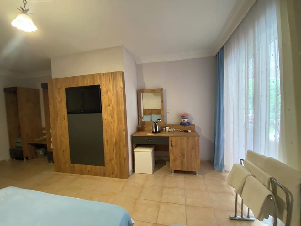 Comfort Quadruple Room, 1 Bedroom, Sea View | 1 bedroom, hypo-allergenic bedding, free WiFi, bed sheets