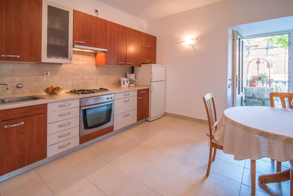 Apartment | Private kitchen | Full-size fridge, oven, stovetop, dishwasher