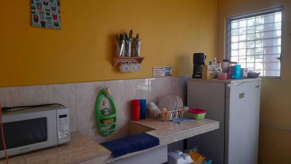 Standard Double Room, Garden View | Private kitchen | Microwave, coffee/tea maker, cookware/dishes/utensils