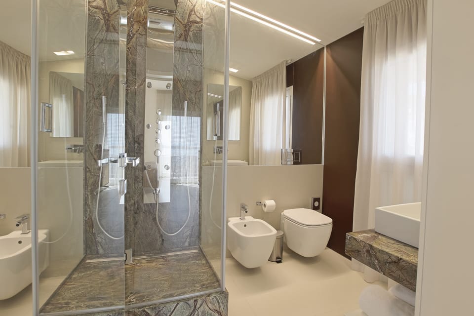 Panoramic Double or Twin Room, Balcony, Sea View | Bathroom | Shower, hydromassage showerhead, free toiletries, hair dryer