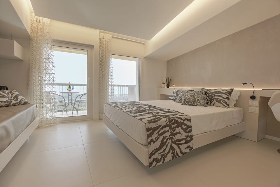 Panoramic Suite, 1 Queen Bed, Balcony, Sea View | Frette Italian sheets, premium bedding, down comforters, pillowtop beds