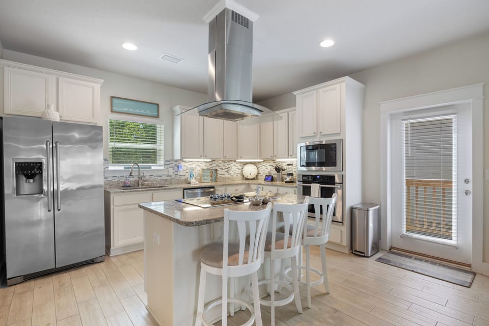 Arborgate Sunkissed Seahorse at 13987 Hanging Branch Way - Kitchen is furnished with all the essential items to cook up today's fresh catch.