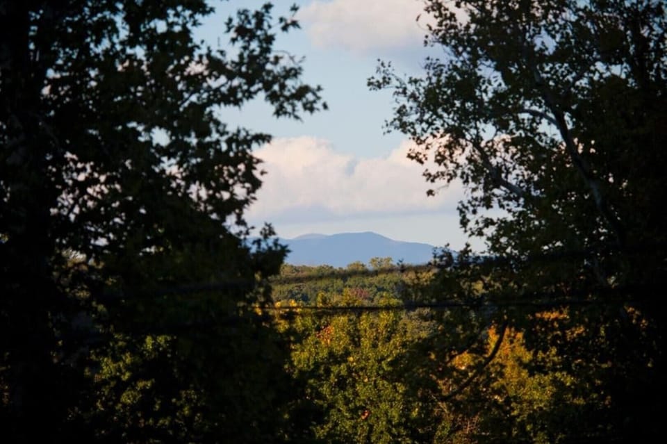 A peek of the mountains serves as a reminder of the attractions close by.