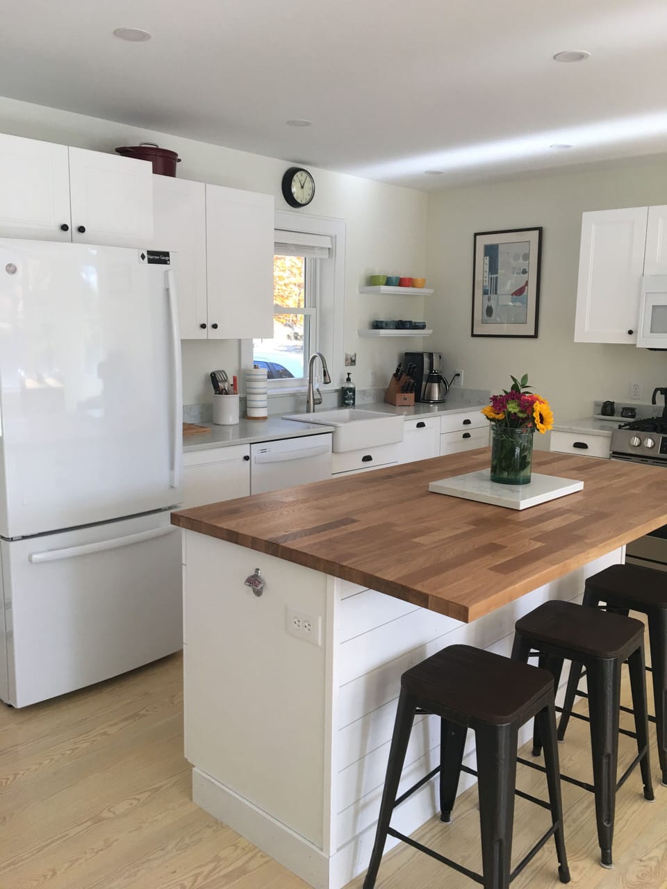 Kitchen has large center island and brand new appliances.
