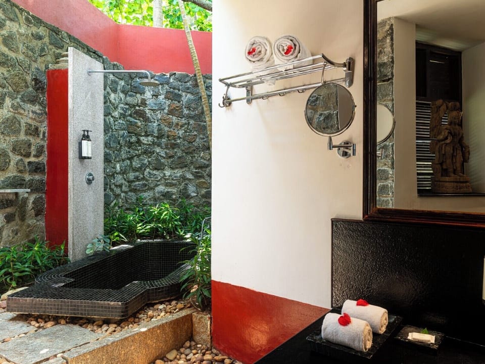 Octagon | Bathroom | Shower, rainfall showerhead, designer toiletries, hair dryer