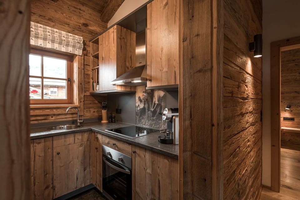 Chalet, 1 Bedroom, Terrace, Mountain View (S`GMIETLENÈ) | Private kitchen | Full-size fridge, oven, stovetop, dishwasher