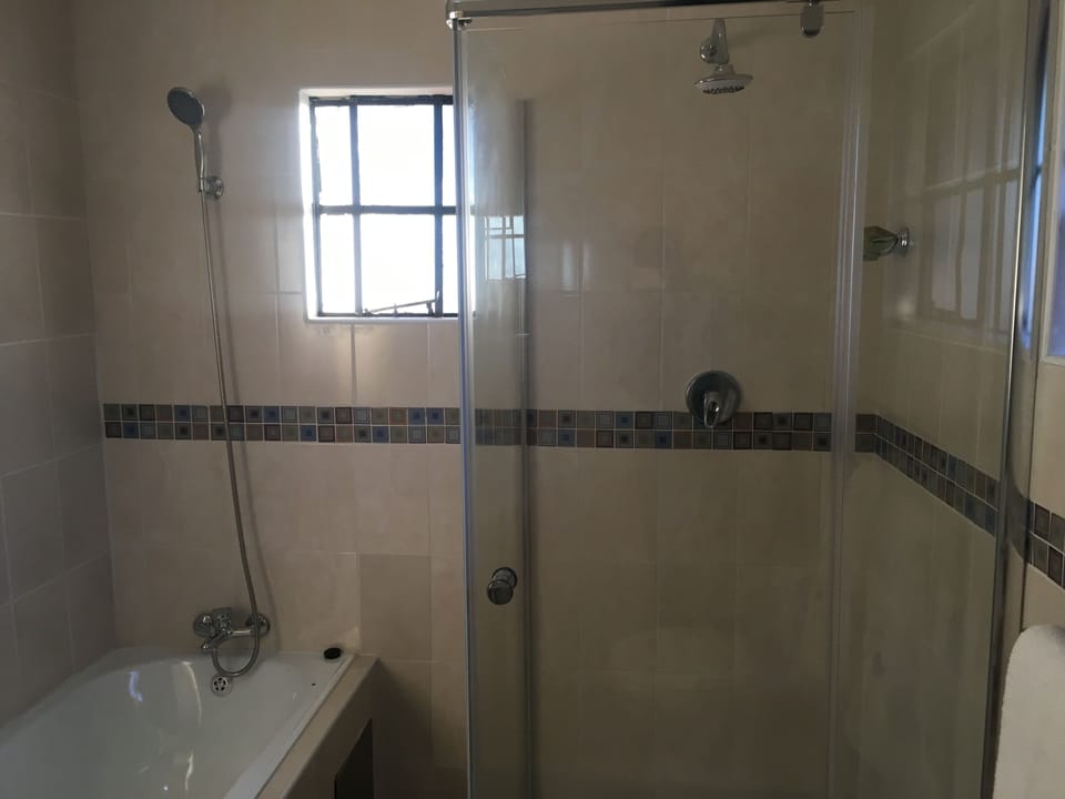 Executive Double Room, 1 Bedroom | Bathroom amenities | Shower, rainfall showerhead, designer toiletries, bathrobes