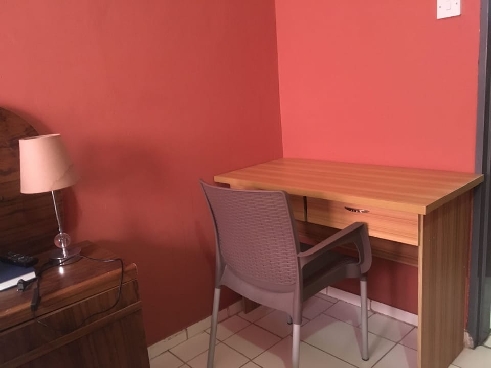 Standard Room, 1 Double Bed | Living area | 40-inch LCD TV with satellite channels, TV
