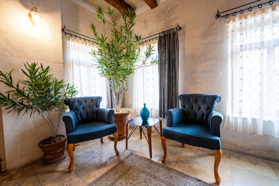 Suite, Courtyard View | Living area | LCD TV, heated floors