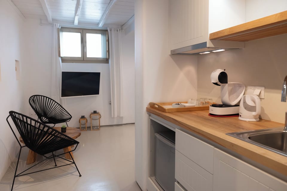 Junior Apartment (Residential) | Private kitchen | Espresso maker, coffee/tea maker, electric kettle, highchair