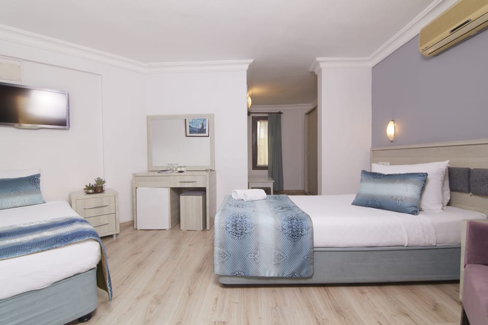 Standard Triple Room | 1 bedroom, premium bedding, minibar, desk
