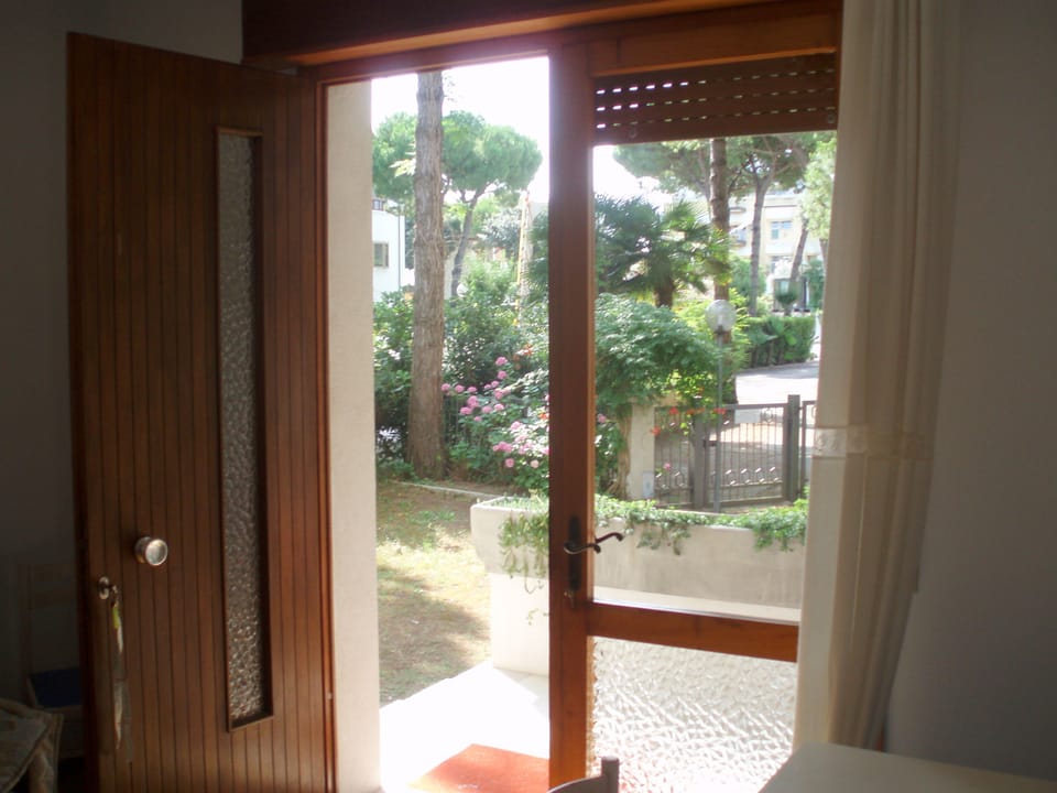 Family Apartment, 2 Bedrooms, Courtyard View, Ground Floor | Living area | Flat-screen TV