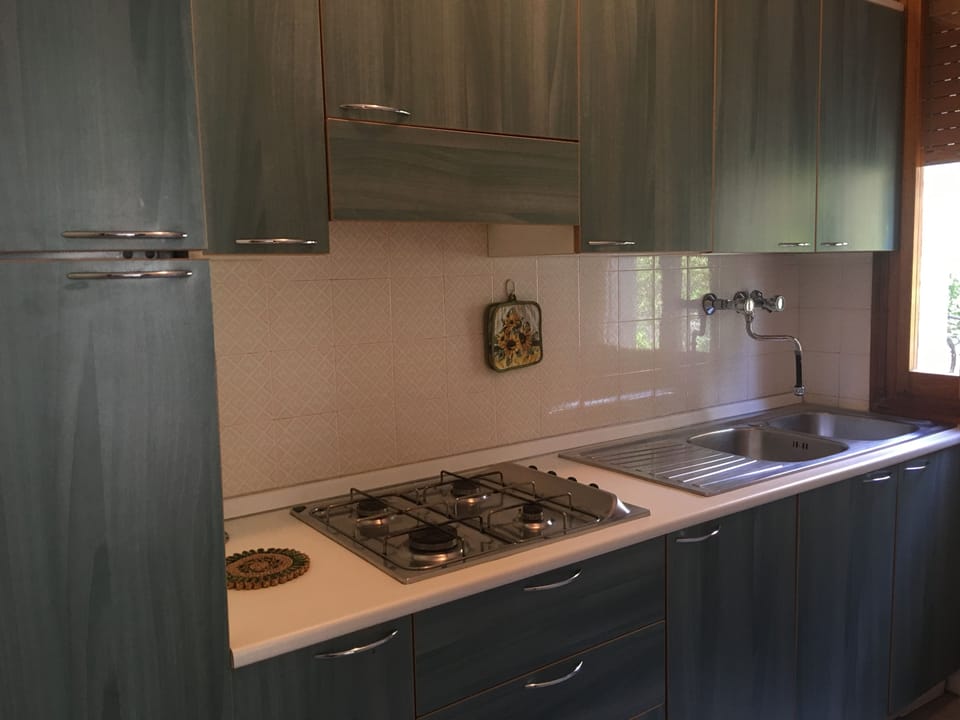 Family Apartment, 2 Bedrooms, Courtyard View, Ground Floor | Private kitchen | Full-size fridge, microwave, oven, stovetop